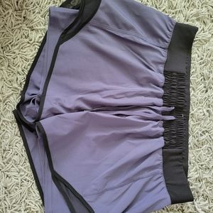 Purple running shorts